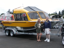 Photos - This is our 06' Customweld Storm 21' in "Hummer Yellow". We absolutely love it! Its been great for fishing, cruising, tubing, camping, scuba diving, sunbathing, picnicing, entertaining friends, and just plain relaxing. A fantastic platform for universal fun in any weather and any location!!! Thanks, Maxxum, for all your help and support.—Jim and Barbara Fisher